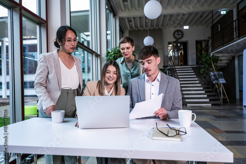 Wallpaper Mural Team discussing business project at modern coworking office Torontodigital.ca