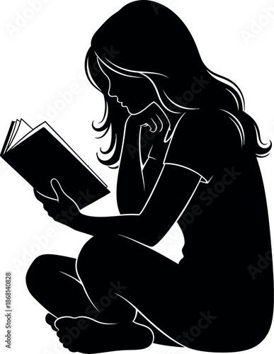 Silhouette of a girl sitting and reading a book in a quiet moment