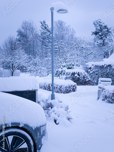 car in snow during storm