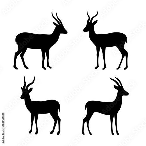 Elegant silhouettes of four gazelles or antelopes standing with curved horns
