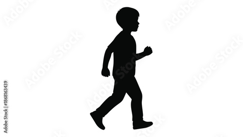 A young boy walking forward in a dark simple silhouette