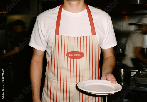 Chef With Apron Mockup Holding Empty Plate PSD
