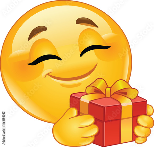 Happy Emoji Emoticon Holding a Wrapped Gift Box