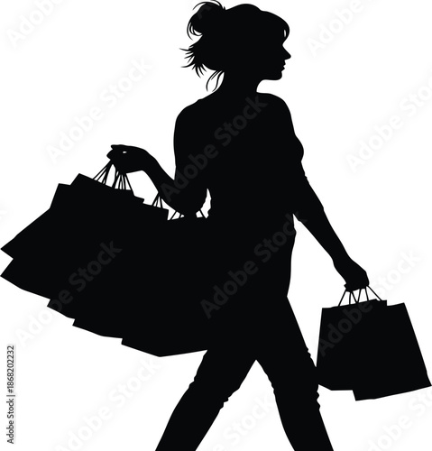 Silhouette of a woman carrying shopping bags