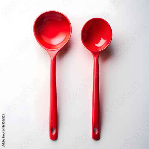 red ladle spoon on white background