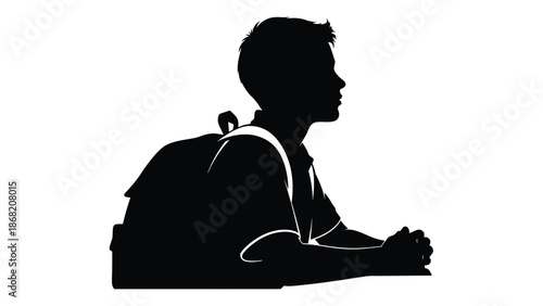 Silhouette profile of a thoughtful young student wearing a backpack, seated and resting his folded hands on a surface while perhaps concentrating on a future goal or assignment