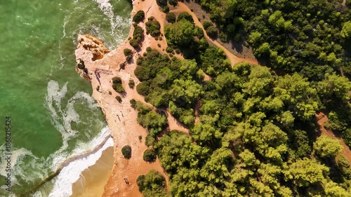 Overhead Drone Shot of Benagil Cave and Rugged Atlantic Shoreline, Algarve, Portugal