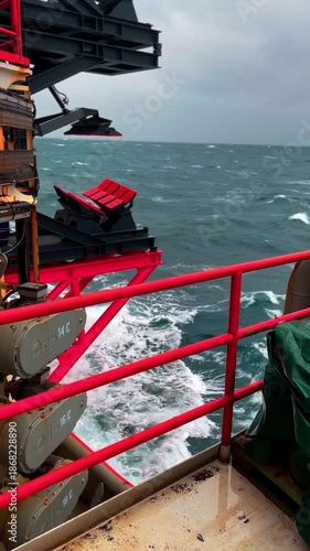 Wallpaper Mural Coastal landscape with active worker, Rugged shoreline scene featuring worker monitoring equipment Torontodigital.ca