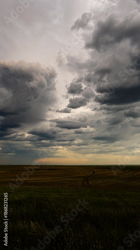 Storm cloud formations showing motion and change in sky with wind, rain and dramatic atmosphere 