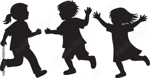 Silhouettes of happy children running and playing together