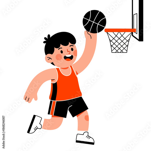 Enthusiastic young athlete energetically leaps towards basketball hoop showcasing youthful