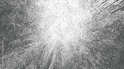 Radial grunge texture with a bright white center and dark gray distressed lines emanating outwards creating a spotlight effect