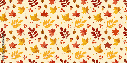 Autumnal pattern of colorful leaves acorns and berries on a cream background