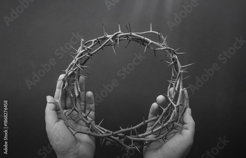 crown of thorns on hands easter background