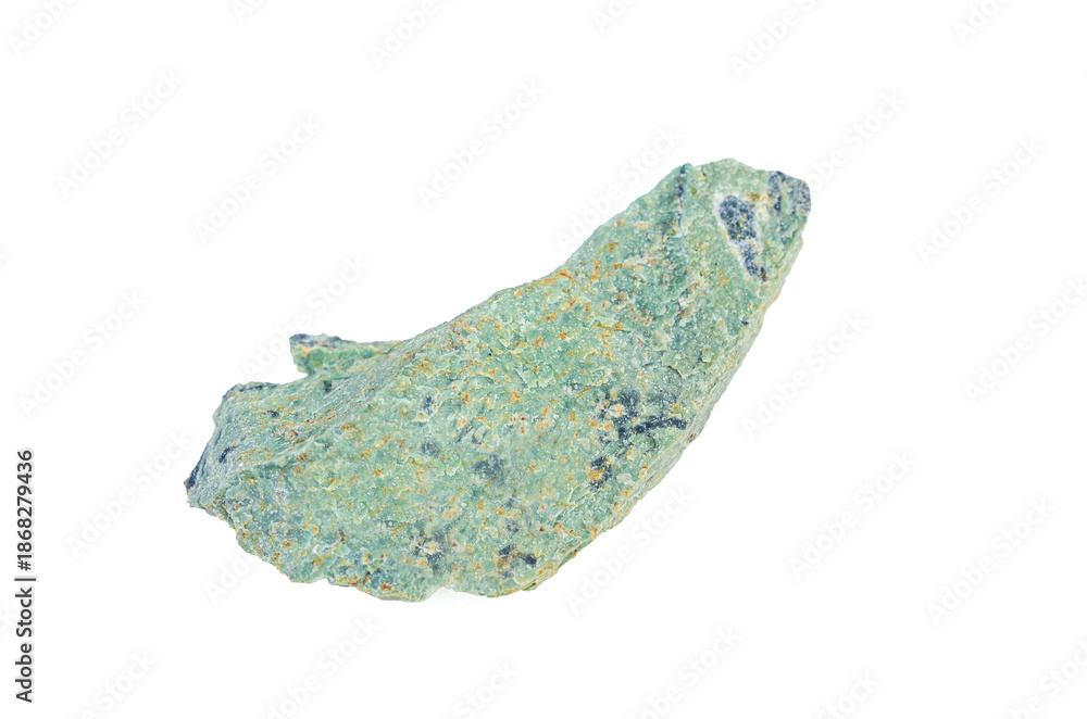 Fototapeta premium A rough, textured green mineral specimen with dark inclusions on a white background