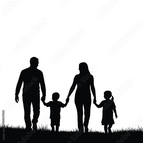 Family walking together holding hands silhouette on grass