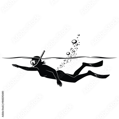 Snorkeling woman silhouette swimming with mask and fins