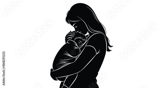 Silhouette of a woman holding and kissing a baby in her arms in a tender moment with mother and love and family and bonding and parenting