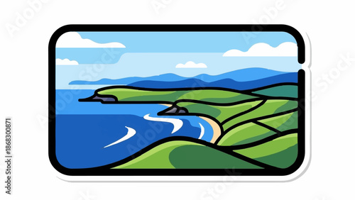 Coastal landscape with rolling green hills meeting the blue sea