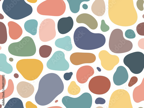 Seamless pattern of multicolored irregular organic shapes on white background