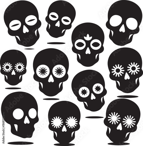 Set of black skulls with white details and flower designs
