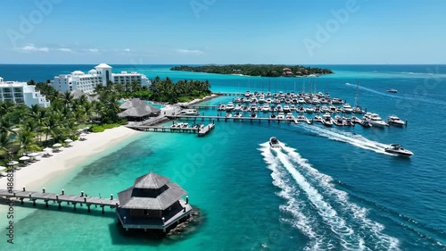 Coastal resort aerial view turquoise waters boats and tropical scenery