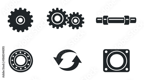 Black and gray mechanical gear components on textured background