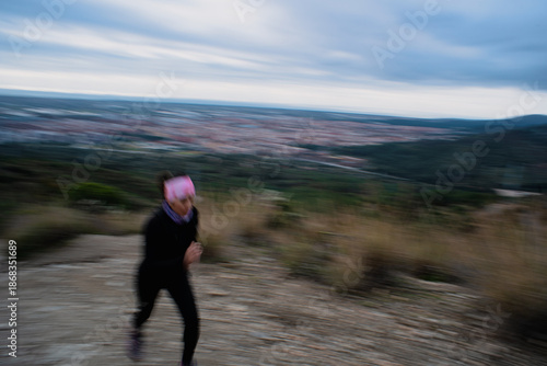 Female Jogger Trail Running Outdoors