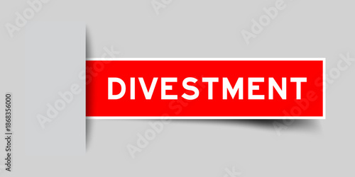 Red color square shape sticker label with word divestment inserted in gray background