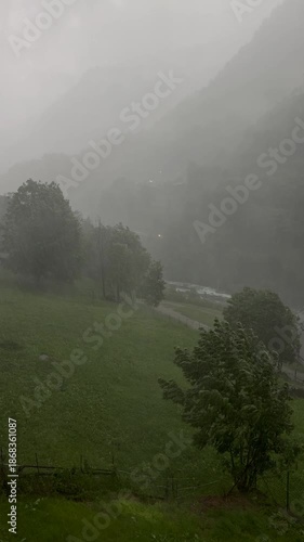 strong summer thunderstorm in a mountain valley