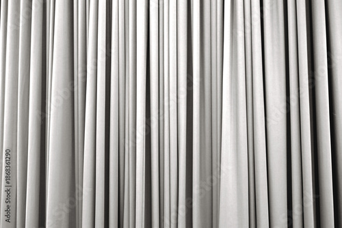 Snowy white curtain with many folds background texture