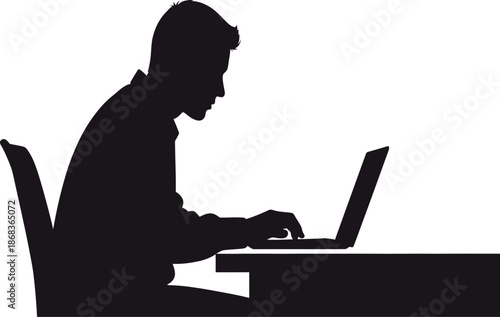 Silhouette of a person working on a laptop computer