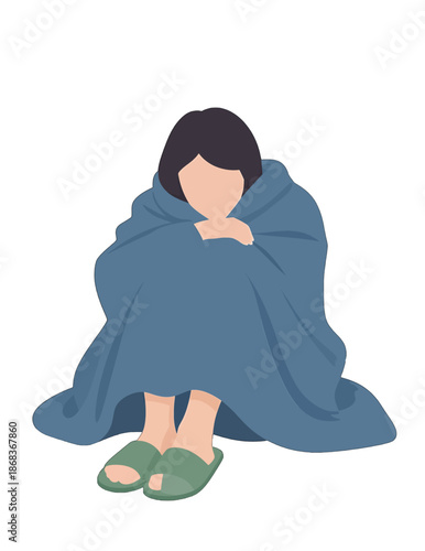 Person wrapped in blue blanket wearing green slippers
