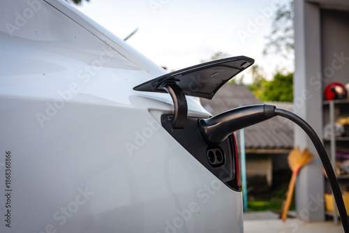 Electric vehicle car charge at home wall charge sustainable transport technology