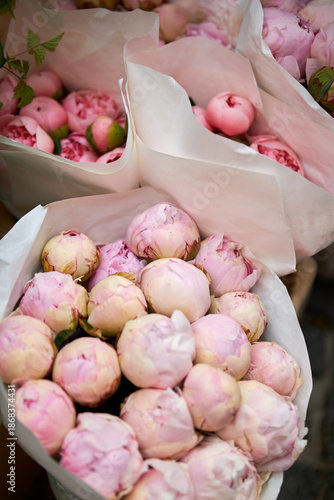 Stalls with flowers and bouquets at local street market