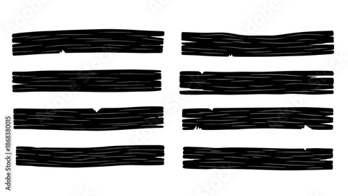 Abstract black scribbles and strokes creating a textured pattern with a random arrangement