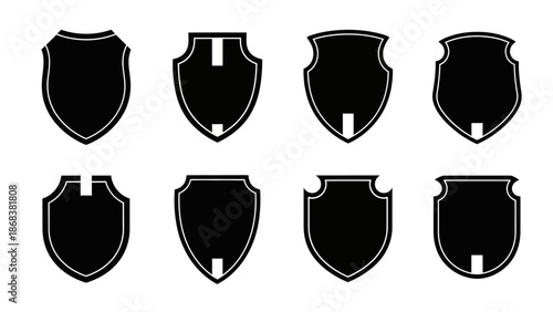 Set of Eight Different Shield Icons with Varying Shapes and Designs for Emblem or Symbol Creation