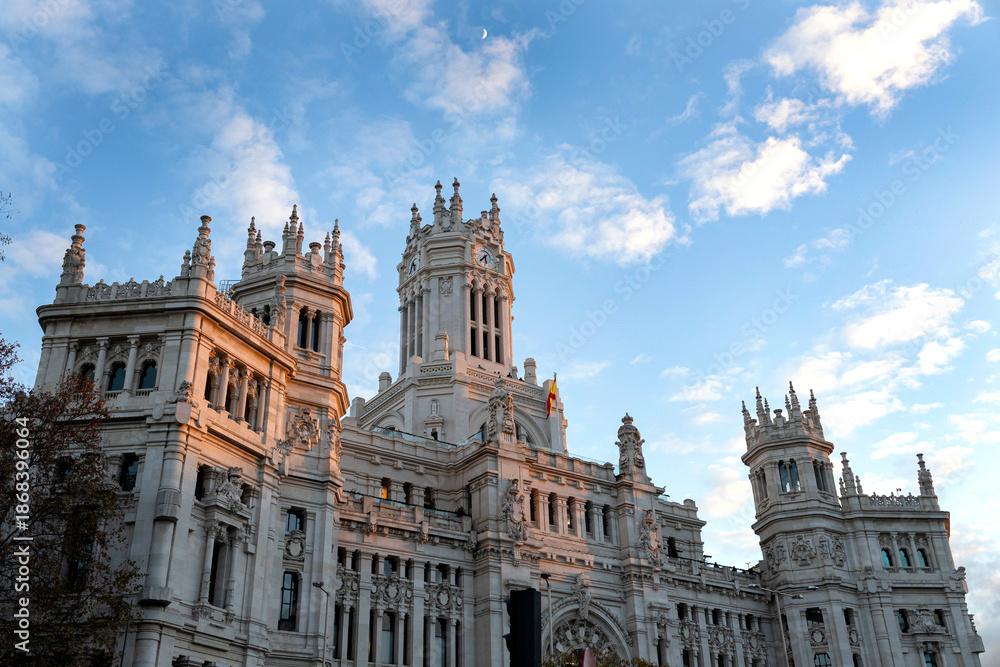Obraz premium Cybele palace architecture with crescent moon and light clouds