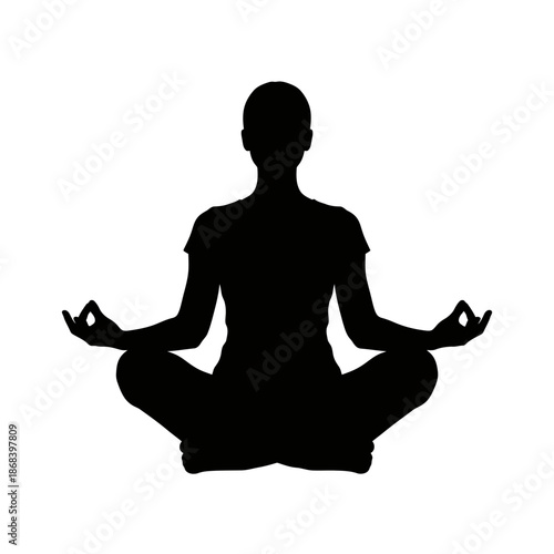 Silhouette of a person in a lotus position meditating peacefully.