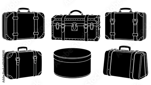 Black and white suitcases and a hatbox isolated on white background