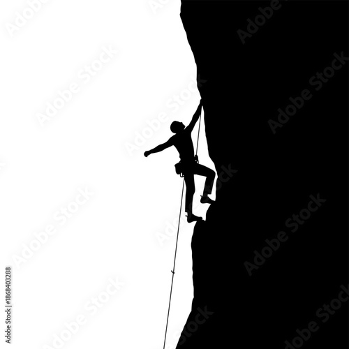 Silhouette of a Man Rock Climbing on a Cliff Edge.