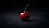 Juicy cherry in a subdued, dark atmosphere