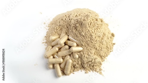 Ashwagandha powder and pills as supplement isolated on white background