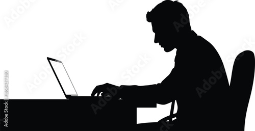 Silhouette of man sitting at desk working on laptop chair