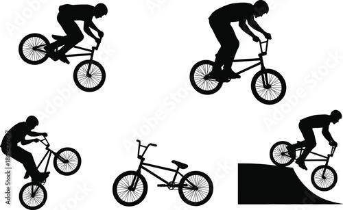 Silhouettes of B M X riders performing tricks on bicycles bike