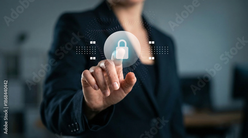 A businesswoman pressing security button in the office. Key locked icon touchscreen interface