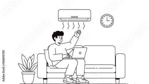 A man sitting on a couch with a laptop and feeling the air conditioning