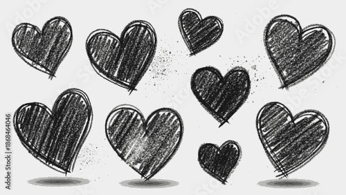 Hand drawn black heart shapes on white background.