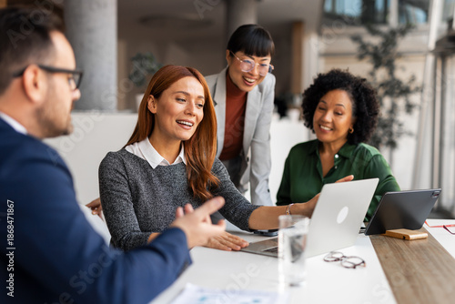 Team Collaboration in Modern Office Environment During a Creative Meeting