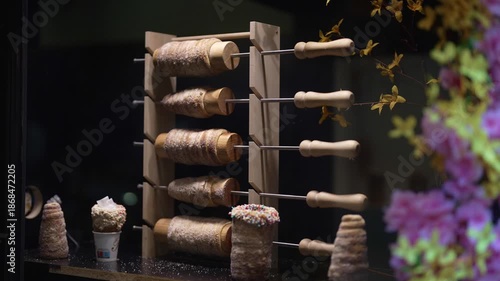 Traditional Czech trdelnik pastry cooking in Prague.